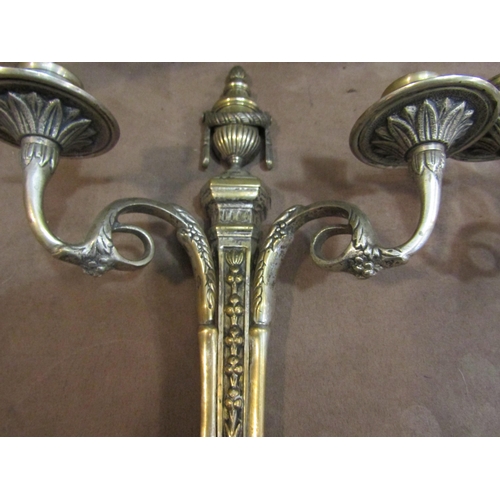 4200 - A pair of brass ornate wall sconces in the Regency taste with traces of original plate, 36cm high   ... 