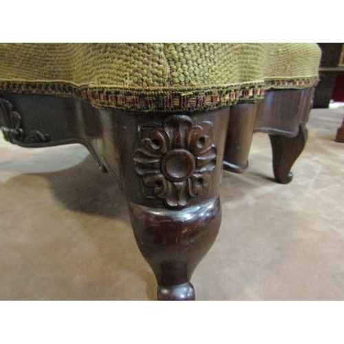 4201 - A 19th Century walnut serpentine side shaped stool the floral petit point upholstered seat over a ca... 