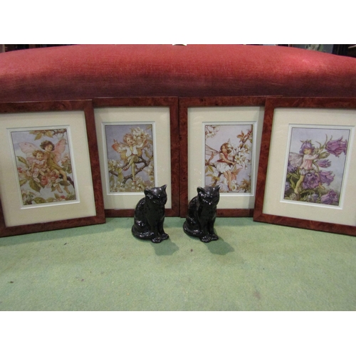 4232 - A set of four modern framed prints of Fairies, 17cm x 12cm and a pair of ceramic black cats (foot re... 