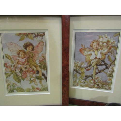 4232 - A set of four modern framed prints of Fairies, 17cm x 12cm and a pair of ceramic black cats (foot re... 