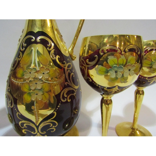 4267 - A bohemain ruby glass and gilt jug and four wine glasses    (E) £10-20