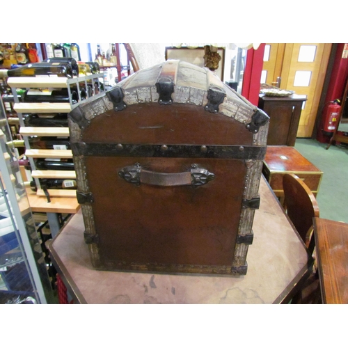 4006 - A Victorian dome top chest on castors with fitted internal compartment shelf, with key, 56cm high, 7... 