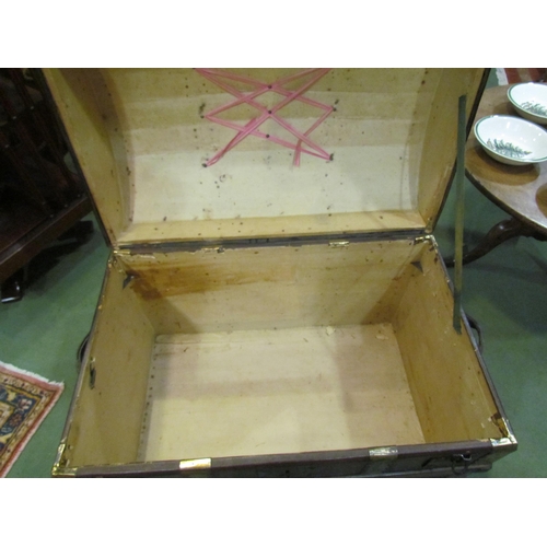 4006 - A Victorian dome top chest on castors with fitted internal compartment shelf, with key, 56cm high, 7... 