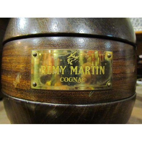 4008 - A Remy Martin Cognac hardwood games compendium in the form of a barrel with Remy Martin plaque, 27cm... 