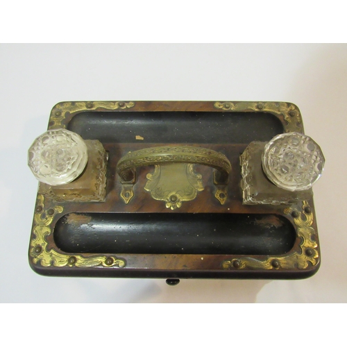 4104 - A mid-late Victorian brass-mounted portable desk stand with two glass inkwells and drawer to base. D... 