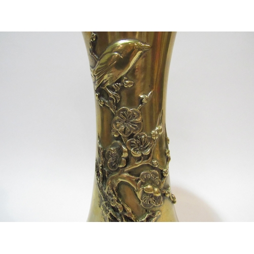 4279 - A brass vase with finch and blossom branch raised decoration, 26cm high    (R) £25