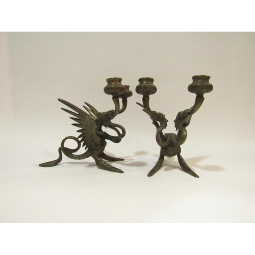 4283 - A pair of Victorian bronze Griffin candlesticks, approximately 18cm high    (R) £80