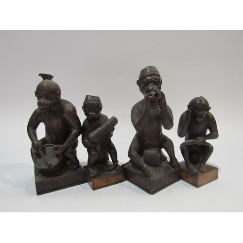 4286 - A carved wooden set of anthropomorphic monkeys playing instruments, reading paper and book (4)