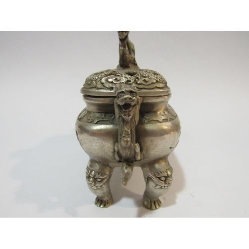 4287 - A Chinese white metal censer and cover having dragon decoration with six character mark to base    (... 