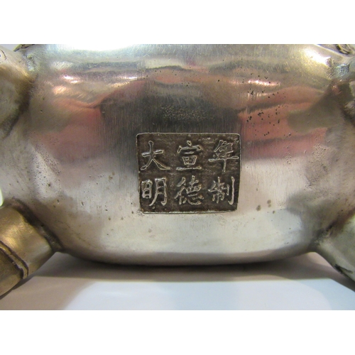 4287 - A Chinese white metal censer and cover having dragon decoration with six character mark to base    (... 