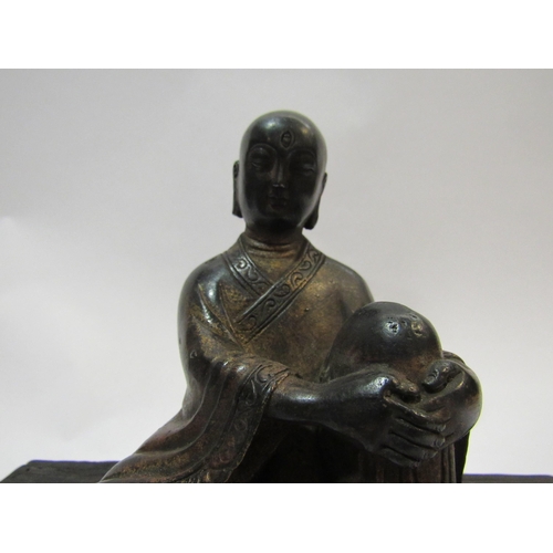 4293 - A Tibetan seated Buddha, 20cm wide x 20cm high   (R) £100