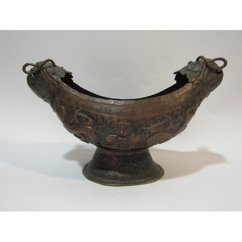 4296 - An 18th Century style Tibetan Repousse copper ceremonial vessel with inlaid turquoise eyes, similar ... 