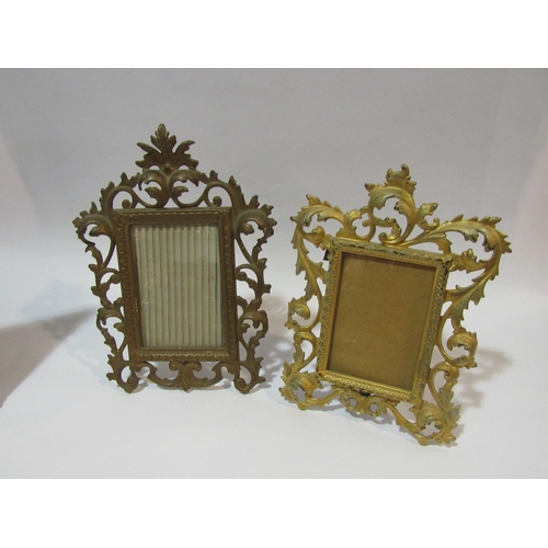 4305 - A pair of ornate acanthus leaf gilt metal table frames together with another rectangular frame