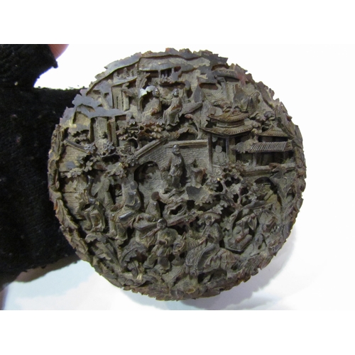 4358 - An Oriental profusely carved in relief tortoiseshell snuff box, A/F, 10cm in diameter