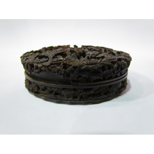 4358 - An Oriental profusely carved in relief tortoiseshell snuff box, A/F, 10cm in diameter