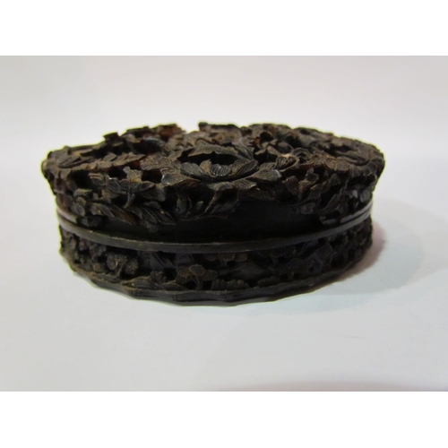 4358 - An Oriental profusely carved in relief tortoiseshell snuff box, A/F, 10cm in diameter