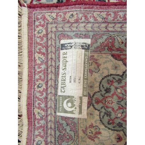 4589 - A modern Persian style rug with all-over leaf and vine detail, 365cm x 270cm