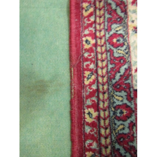 4589 - A modern Persian style rug with all-over leaf and vine detail, 365cm x 270cm