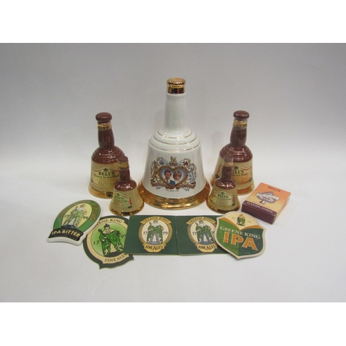 4555 - A Charles & Diana Bell's whisky barrel, four smaller examples, coasters and playing cards etc.