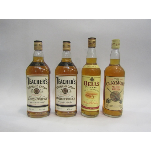 4567 - Four bottles of whisky including two Teacher's, Bell's and Claymore