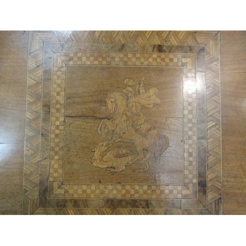 4099 - An inlaid parquetry table on quatre form base, the top inlaid with a depiction of St George and the ... 