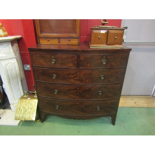 4153 - A George III flame mahogany bow front chest of two short over three graduating long drawers with oak... 