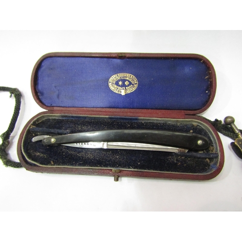 4369 - Vintage items including lady's note book, sewing clamp skirt lifter, razor