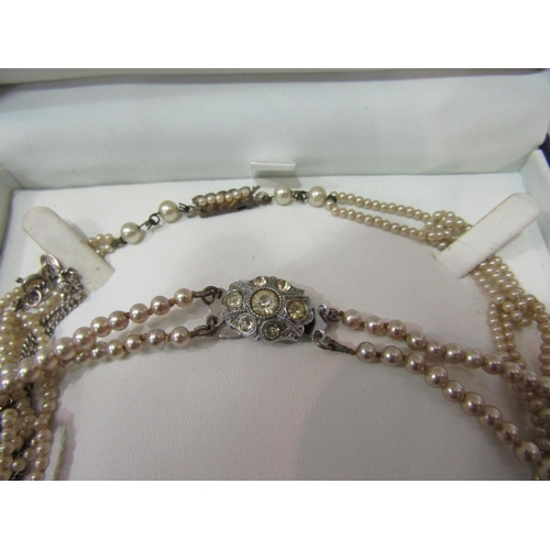 4375 - A looped link pearl necklace, faux pearl necklace etc