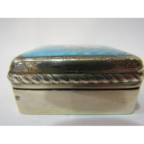 4382 - An Edwardian silver pill / trinket box with guilloche enamel lid decorated with handpainted flowers,... 