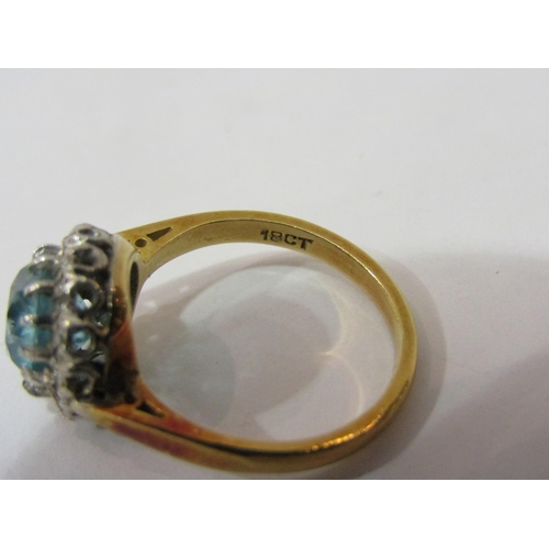 4386 - An 18ct gold Aquarmarine ring set with diamond chip (0.5cm across stone)