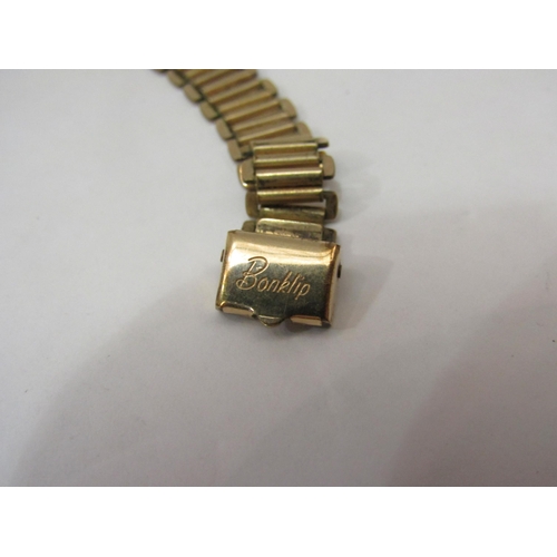 4400 - A lady's gold cased wristwatch     (R) £50