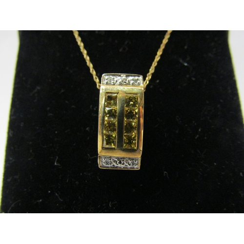 4434 - A yellow sapphire and diamond pendant hung on chain stamped 375, 48cm long 3.3g in total    (C)