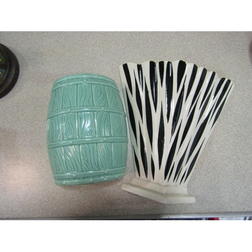 1209 - Two wall pockets: zebra pattern and barrel form