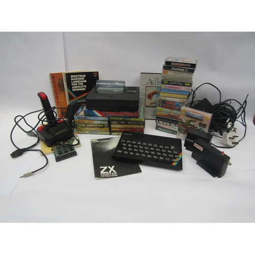 5021 - A ZX Spectrum computer games system with joystick, Alphacom 32 printer, various games and accessorie... 