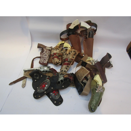 5043 - A collection of playworn toy guns, cap guns and pistols including Wicke, Marx etc together with asso... 