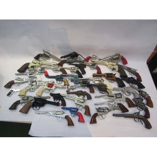 5044 - A collection of playworn toy guns, cap guns and pistols including Crescent, Lone Star etc (37)