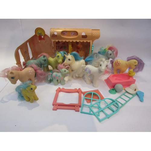 5048 - Nine 1980's Hasbro My Little Pony figures and plastic carry case          (C)