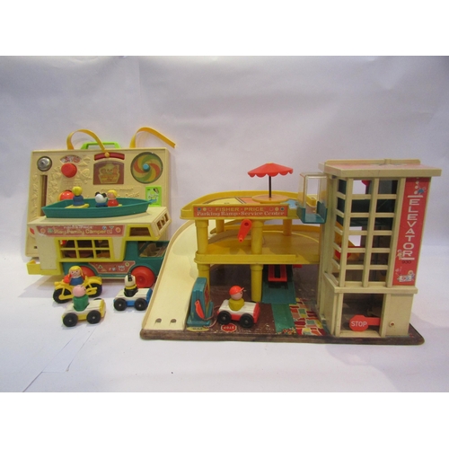 5055 - A Fisher Price car park, activity center and Play Family  Camper (3, a/f)