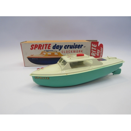 5081 - A boxed Sutcliffe Toy 'Sprite' Day Cruiser tinplate clockwork boat