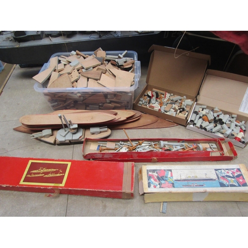 5084 - A collection of 1940's painted wooden ship construction toy blocks, bases, accessories and plans