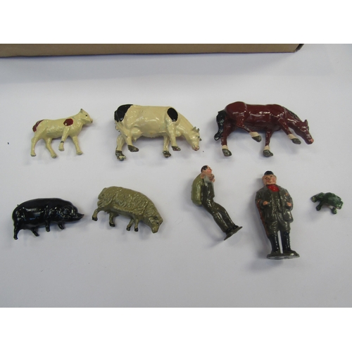 5093 - A collection of painted lead farm animals and figures including J Hill Co examples, together with a ... 