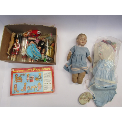 5103 - A vintage cloth bodied doll with painted composition head, assorted dolls outfits, costume dolls and... 