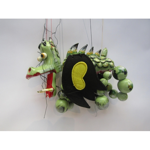 5121 - A Pelham Puppets Mother Dragon puppet in yellow card box