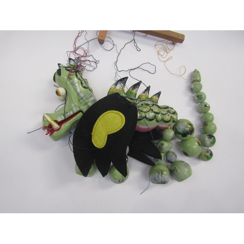 5121 - A Pelham Puppets Mother Dragon puppet in yellow card box