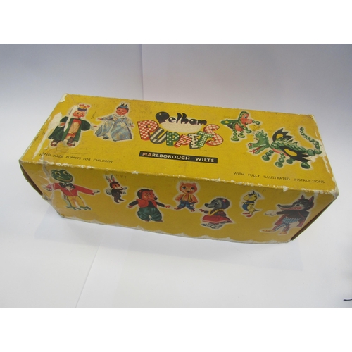 5121 - A Pelham Puppets Mother Dragon puppet in yellow card box