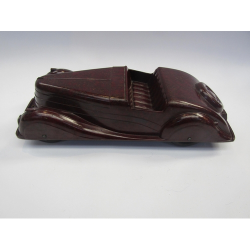 5123 - A Codeg mottled brown bakelite open topped tourer car, 34.5cm long        (R) £80