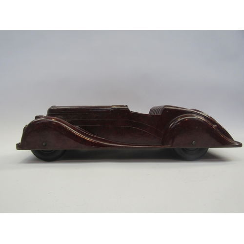 5123 - A Codeg mottled brown bakelite open topped tourer car, 34.5cm long        (R) £80