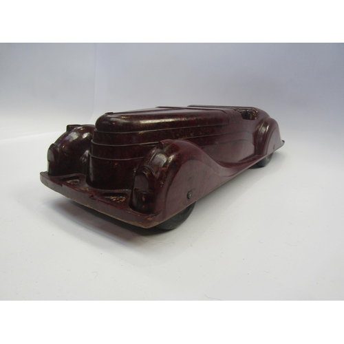 5123 - A Codeg mottled brown bakelite open topped tourer car, 34.5cm long        (R) £80