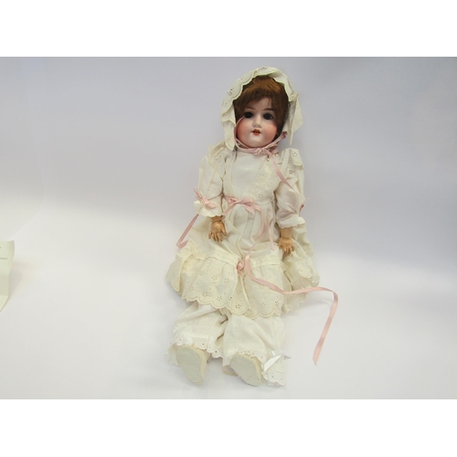 5128 - A late 19th/early 20th Century Armand Marseille bisque head doll on jointed body, 54cm tall