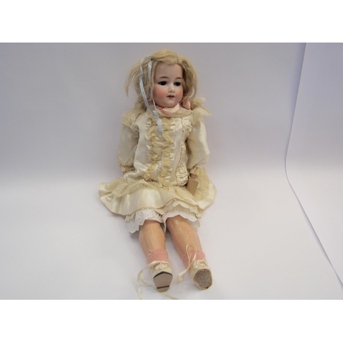 5132 - An Armand Marseille bisque head doll on jointed composition body, sleepy brown eyes and open mouth s... 